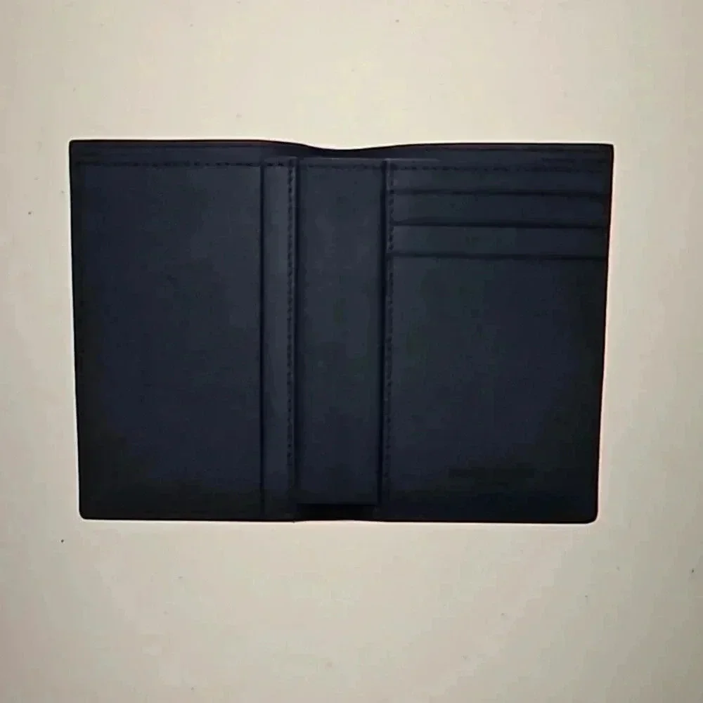 Saint Laurent Paris Credit Card Wallet Black Embossed Leather